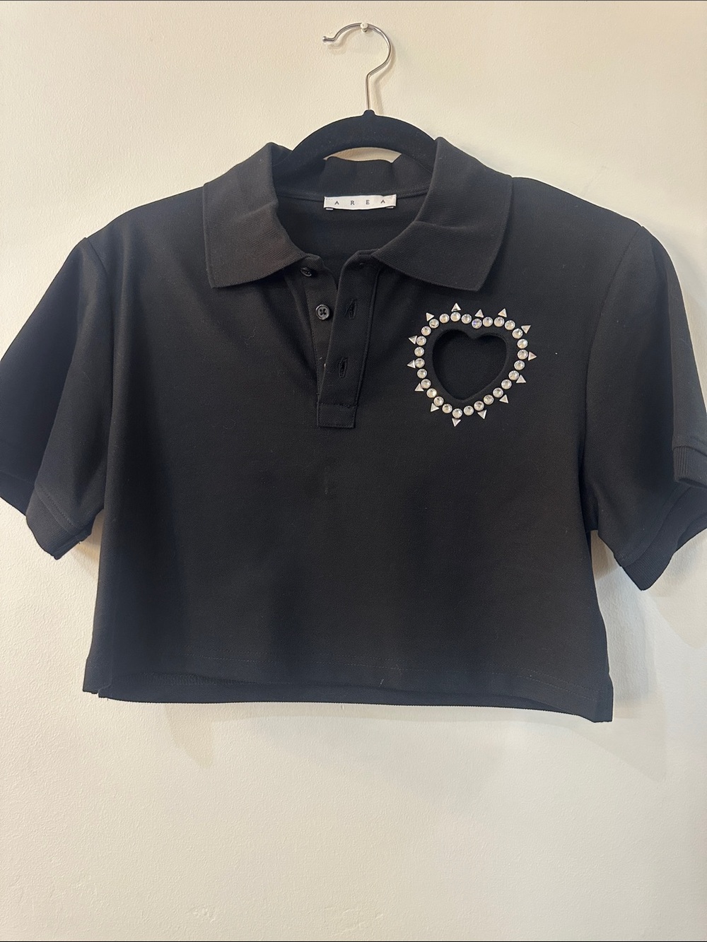 AREA Black Cropped Polo with Studded Heart Accent